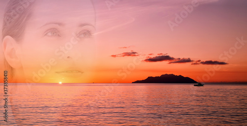 Collage of a dreaming woman and sunset over the ocean.