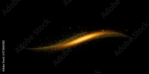 Golden glittering, sparkling magic light effect isolated on black background.