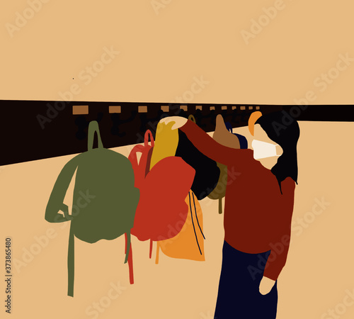 Kid wearing face mask hanging backpack with hook on the wall in a classroom.COVID-19 prevention while going back to school and new normal concept.