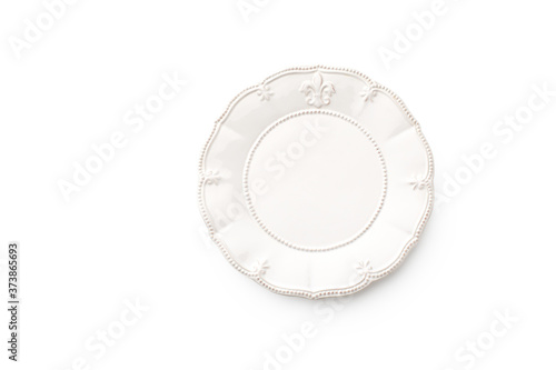 Top view of empty plate isolated on white background