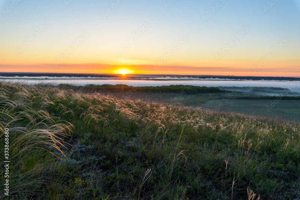 sunrise, fog over the river panorama of the landscape in the early morning. pink sky before sunrise . background image