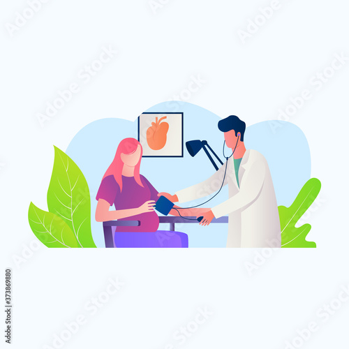 Doctor checking pregnant patient blood pressure