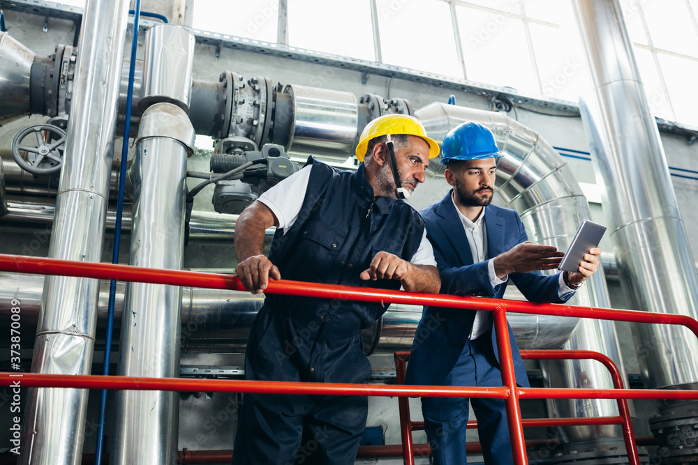 custom made wallpaper toronto digitalbusinessman and worker looking at the tablet at the heating plant