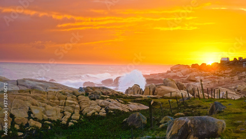 Breathtaking shot of beautiful and scenic sunset at Cabo Polonio photo