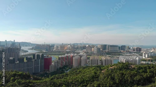 Forward movement aerial view of Macau cityscape from Coloane photo