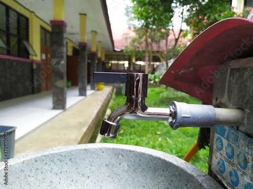 Portable sink for hand washing at senior high school