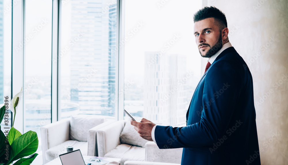 Smart office employee using smartphone at office Smart office employee using smartphone at office