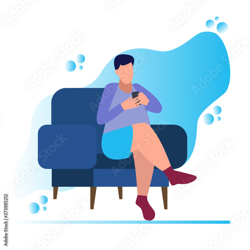 A young man is sitting in a chair and looking at the phone, a man is sitting with the phone