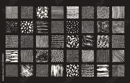 Hand drawn textures and brushes. Big artistic collection of handcrafted design elements: rough graphic patterns, ethnic ornaments, abstract lines, tribal symbols made with ink. Isolated vector set.