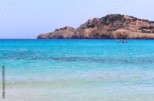 Beautiful seascape with clear blue water and a picturesque cape. Mallorca Island, Spain.