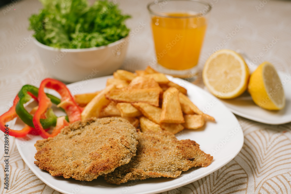 Milanesa con papas Milanesa con papas