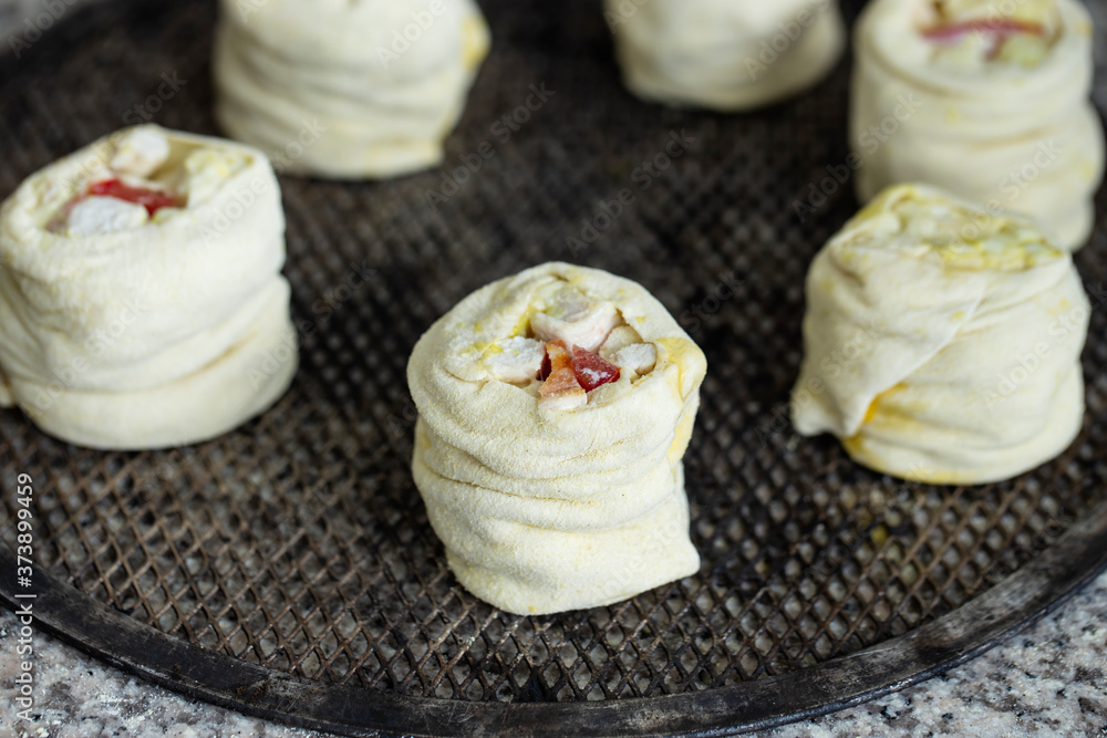 The process of making pizza.