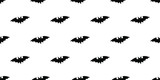 Black silhouette of a bat isolated on a white background.  Seamless pattern.  Vector background for Halloween