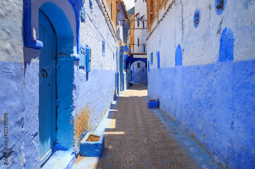 View of the blue walls of Medina in Chaouen, Morocco. The city is noted for its buildings in shades of blue and that makes Chefchaouen very attractive to visitors.