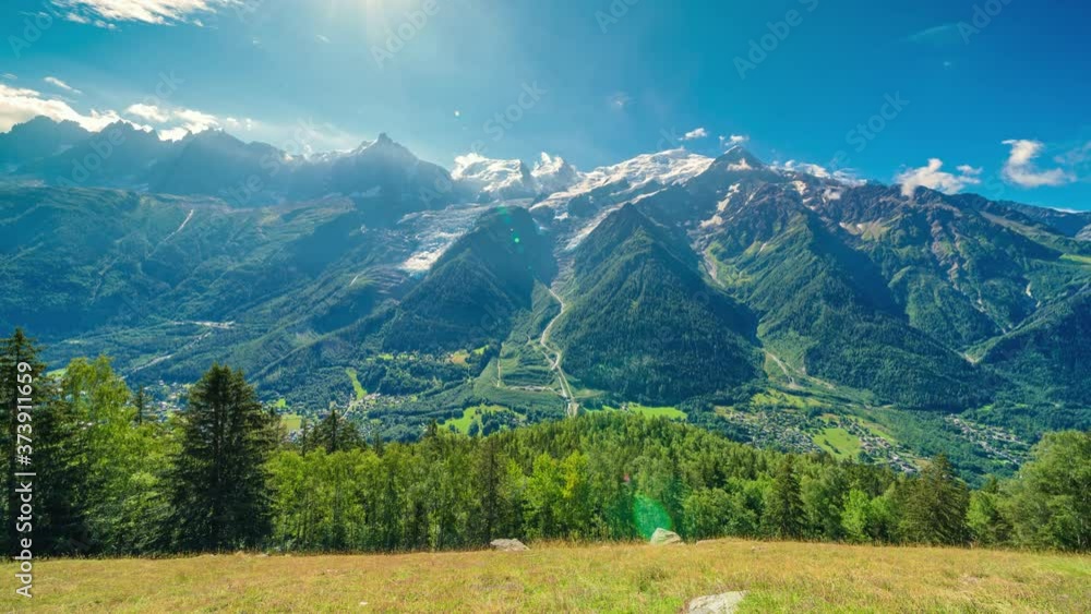 custom made wallpaper toronto digital4K timelapse of snowy peaks of French Alps Mountains in Chamonix. Mont-Blanc landscape and Pine forest.Swiss rustic scene.Panoramic aerial view of the valley and the lovely town.