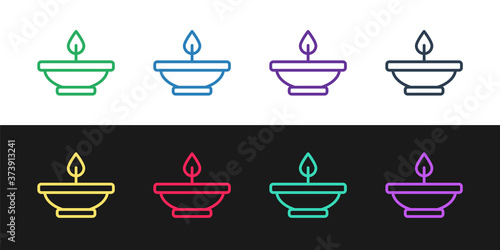 Set line Aroma lamp icon isolated on black and white background. Vector.