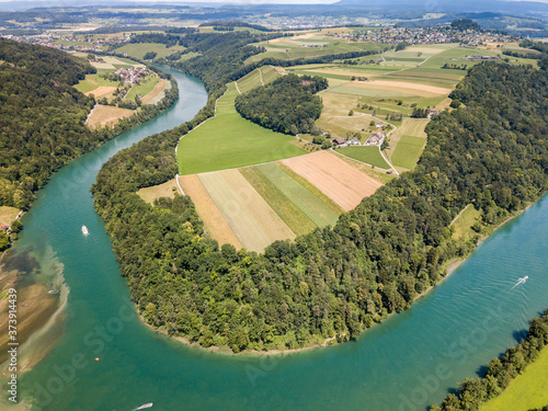 Aerial drone image of Rhine sinuosity or loop at Toesegg in Canton Zurich, Switzerland photo