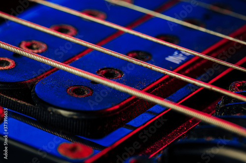 Guitar fingerboard with strings close up photo