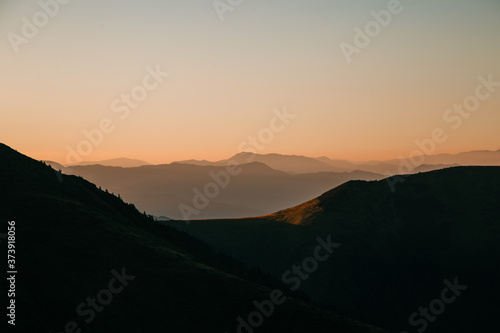 Amazing sunset in the wild ukrainian ridge Marmarosy, near Romania