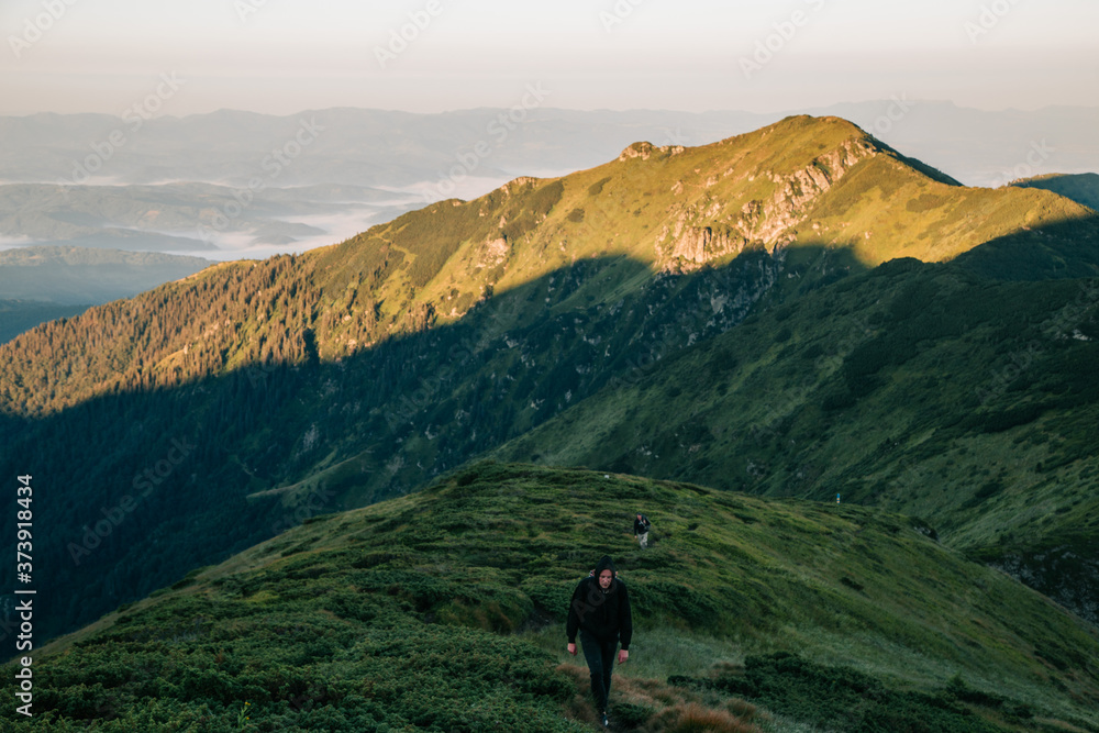 Fototapeta premium Amazing sunset in the wild ukrainian ridge Marmarosy, near Romania