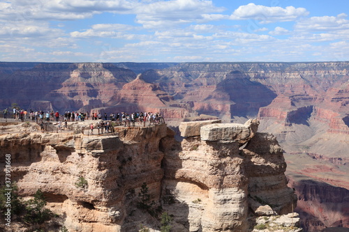 Tourists visit Grand Canyon South Rim at Mather Point in Arizona USA
