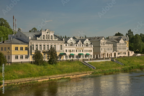 Tveretskaya embankment of Tvertsa river in Torzhok. Tver region. Russia photo