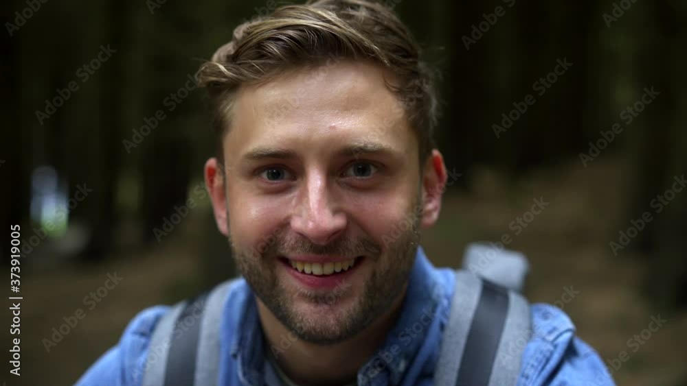 Portrait of smiling hiker in the forest Portrait of smiling hiker in the forest