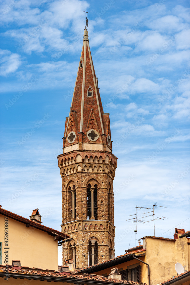 Bell Tower of the Badia Fiorentina (Abbazia di Santa Maria, Abbey), ancient church in Florence downtown, in Gothic and Baroque style. Tuscany, Italy, Europe