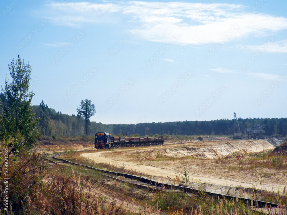 Train on the railroad at Lopatinsky sand quarry