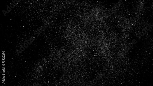 Dust particles on black background. 3D effect with snow glare and flare sparkle
