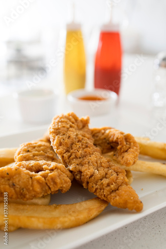 Chicken Strips and French F...