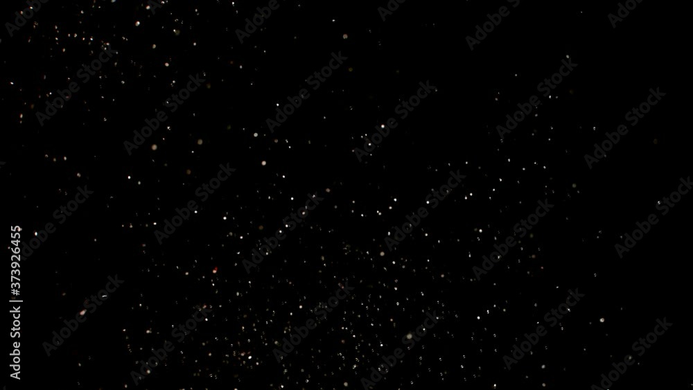 Dust particles on black background. 3D effect with snow glare and flare sparkle Dust particles on black background. 3D effect with snow glare and flare sparkle