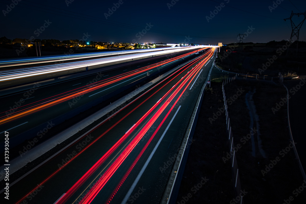 Autoroutes A9 et A709 entre Nîmes et Montpellier de nuit en longue exposition (light trails) Autoroutes A9 et A709 entre Nîmes et Montpellier de nuit en longue exposition (light trails)