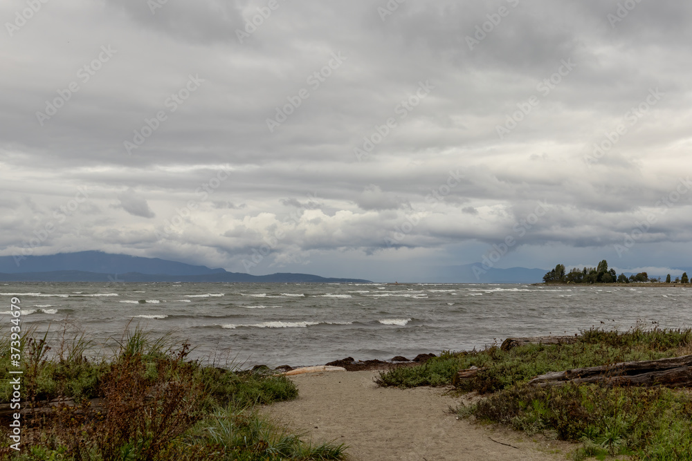 storm clouds over the sea, wave beach and mountain
