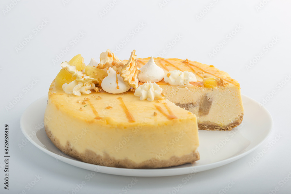 Caramel apple pear cheesecake. Close up side view stone kitchen table, side view. Autumn dessert. Woman decorated apple cake Caramel apple pear cheesecake. Close up side view stone kitchen table, side view. Autumn dessert. Woman decorated apple cake