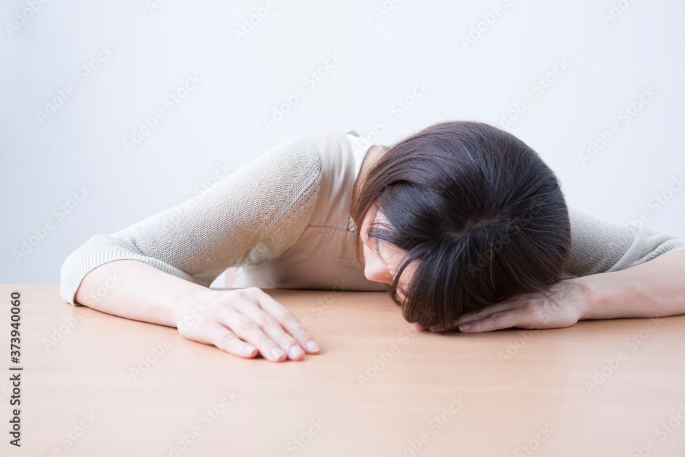 具合が悪い女性