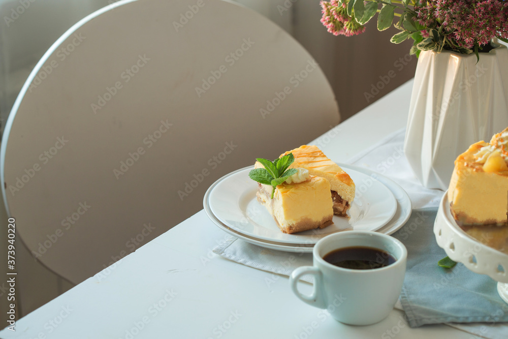 Caramel apple pear cheesecake. Close up side view stone kitchen table, side view. Autumn dessert. Woman decorated apple cake Caramel apple pear cheesecake. Close up side view stone kitchen table, side view. Autumn dessert. Woman decorated apple cake