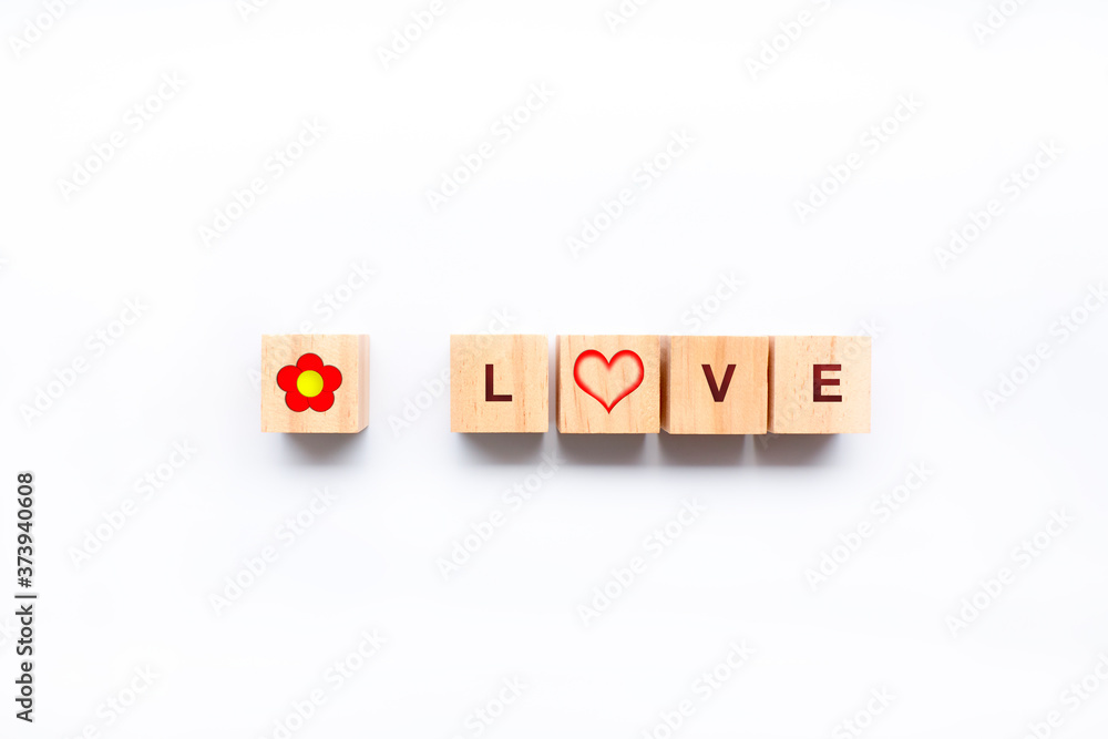 Wooden cubes with a flos and the word LOVE and a heart Wooden cubes with a flos and the word LOVE and a heart