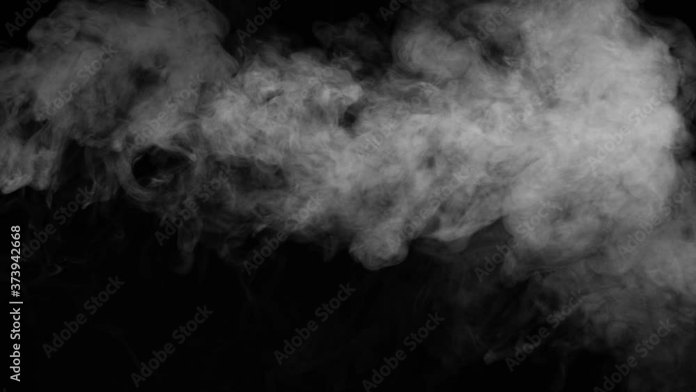 Portion Smoke Floats Right. White dense smoke moves slowly on a black background, creating beautiful swirls. Filmed at a speed of 120fps Portion Smoke Floats Right. White dense smoke moves slowly on a black background, creating beautiful swirls. Filmed at a speed of 120fps
