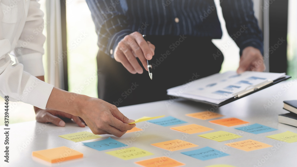Start up teamwork meeting with business project. Start up teamwork meeting with business project.