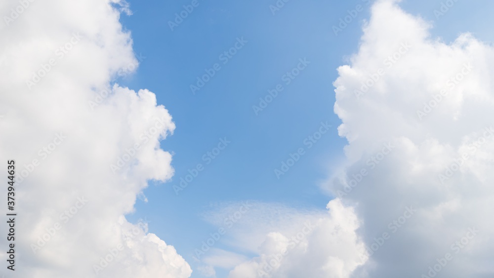 Scenic sky panorama background. Blue sky with fluffy white clouds. Copy space Scenic sky panorama background. Blue sky with fluffy white clouds. Copy space