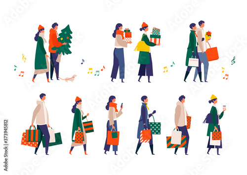 Some people performing christmas outdoor activities. Shopping, walking, drinking and texting from phone.