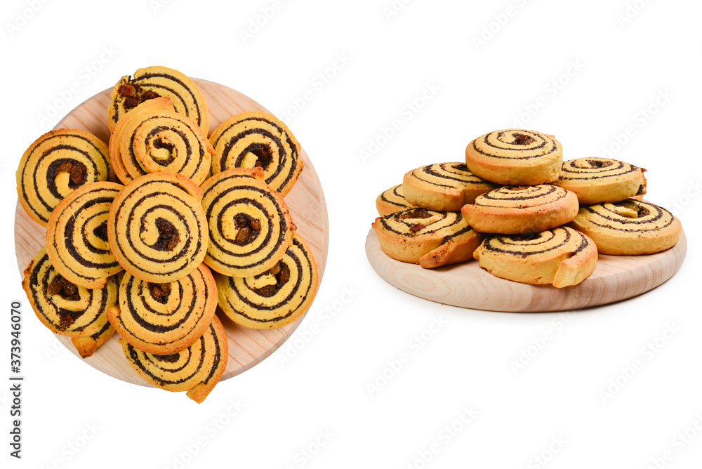 Fototapeta premium Baked cookies with raisins and poppy seeds isolated on white background.