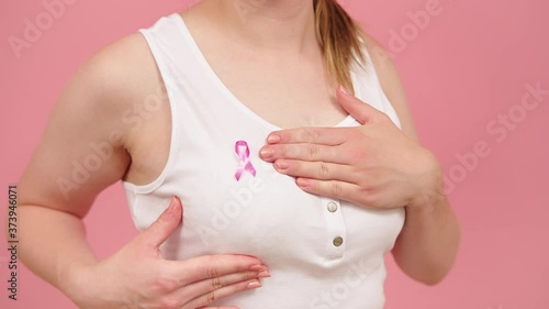 Wallpaper Mural Woman examining her breast. Breast cancer awareness concept. High quality 4k footage Torontodigital.ca