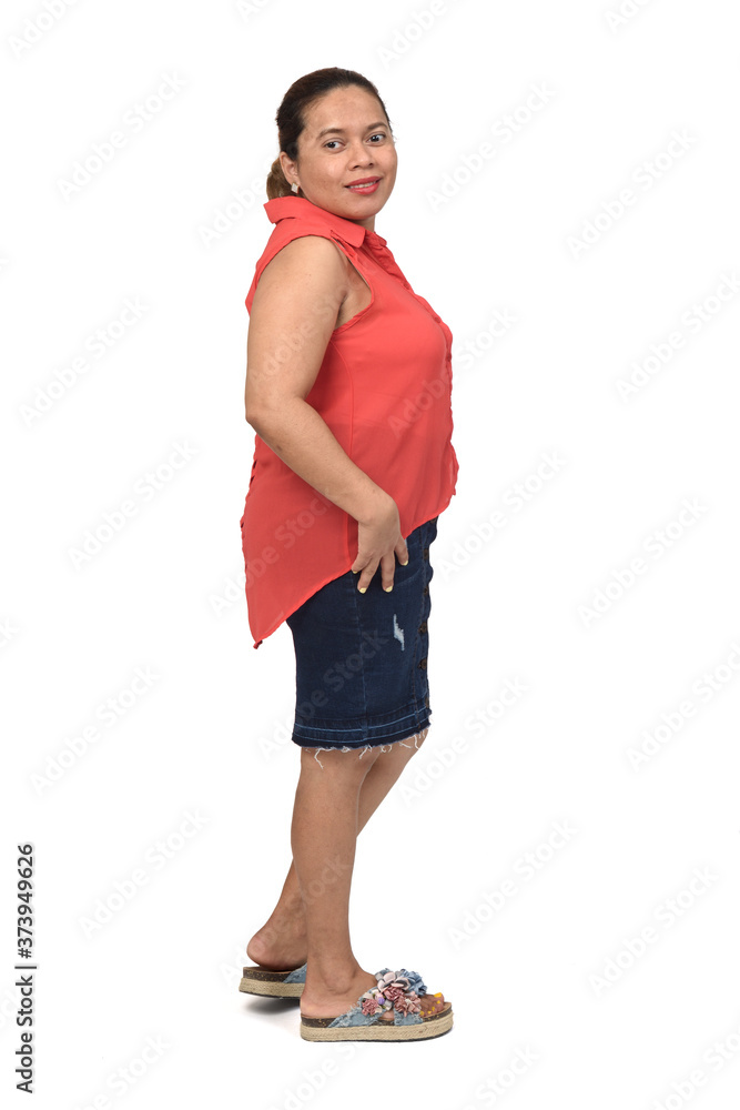 side view of full portrait of a woman with skirt on white background, looking at camera side view of full portrait of a woman with skirt on white background, looking at camera