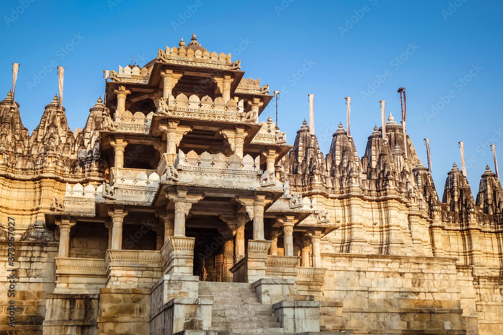 Ranakpur Jain temple in Rajasthan, India. The temple built using white marble, with 1444 pillars, 80 domes and 426 columns all intricately carved and unique. This is one of  the  largest Jain temple.