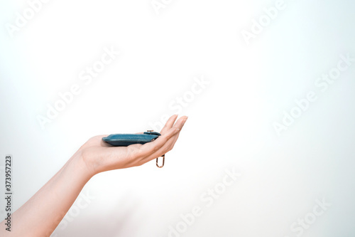 new wireless car key in beauty woman hand with white background