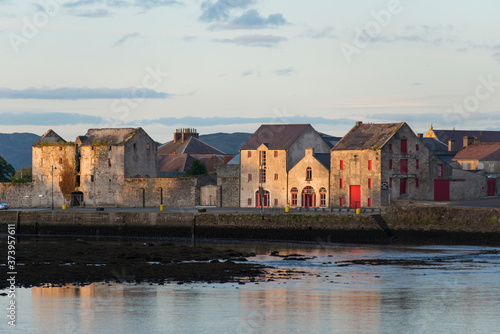 View of warehouses on the waterfront, Rathmelton, County Donegal, Ulster Province, Republic of Ireland.