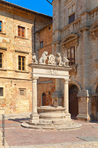 Old town impressions in Tuscany, Montepulciano, with the city fountain, Italy.