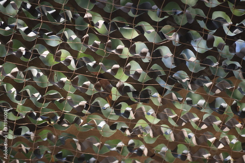 Camouflage net which is used for hiding something from airstrikes.
